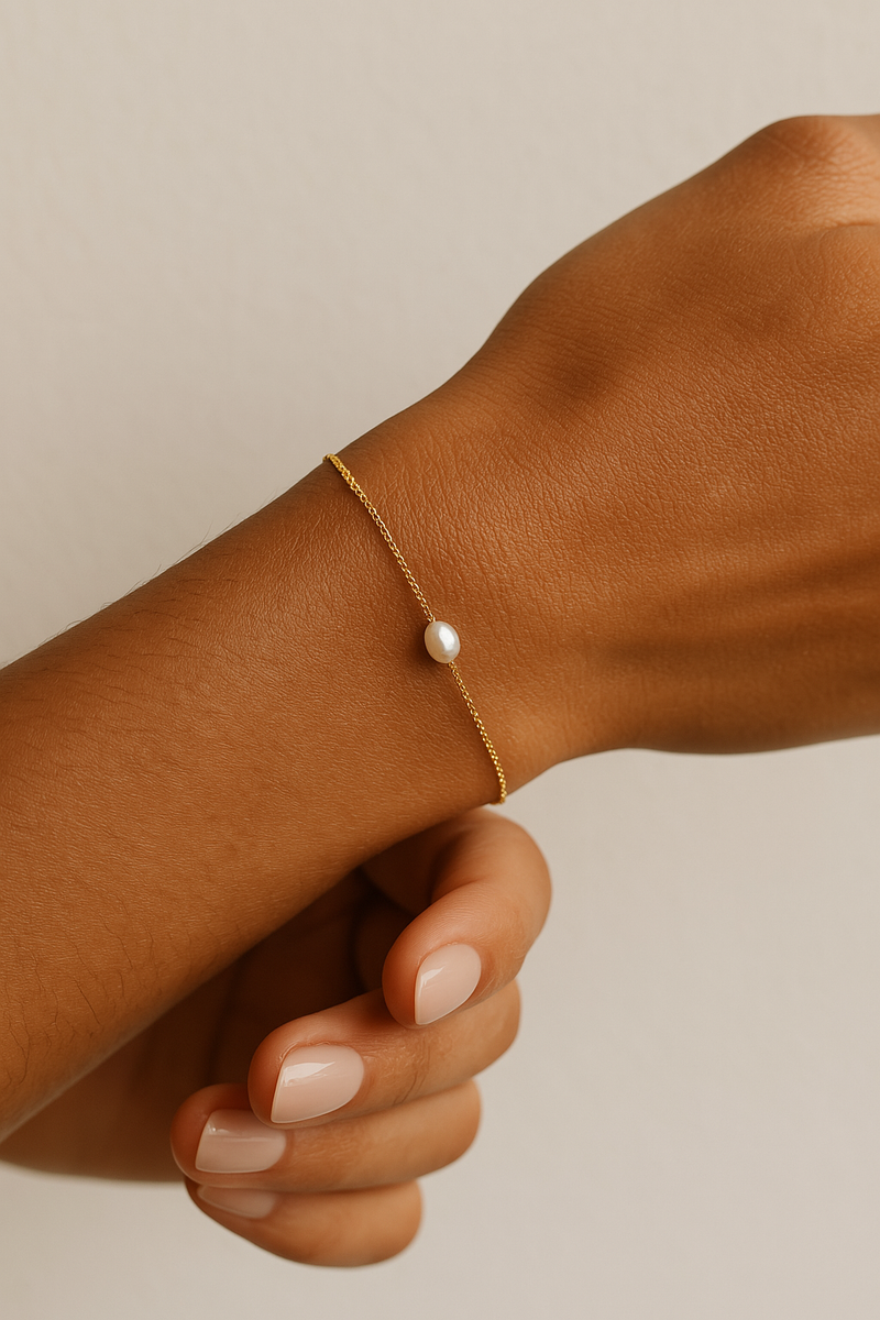 Joli bracelet avec une perle de culture