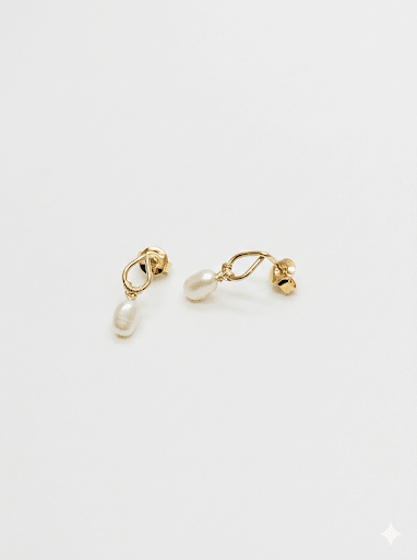 Boucles d'oreilles perles d'eau douce dorées sur support organique design