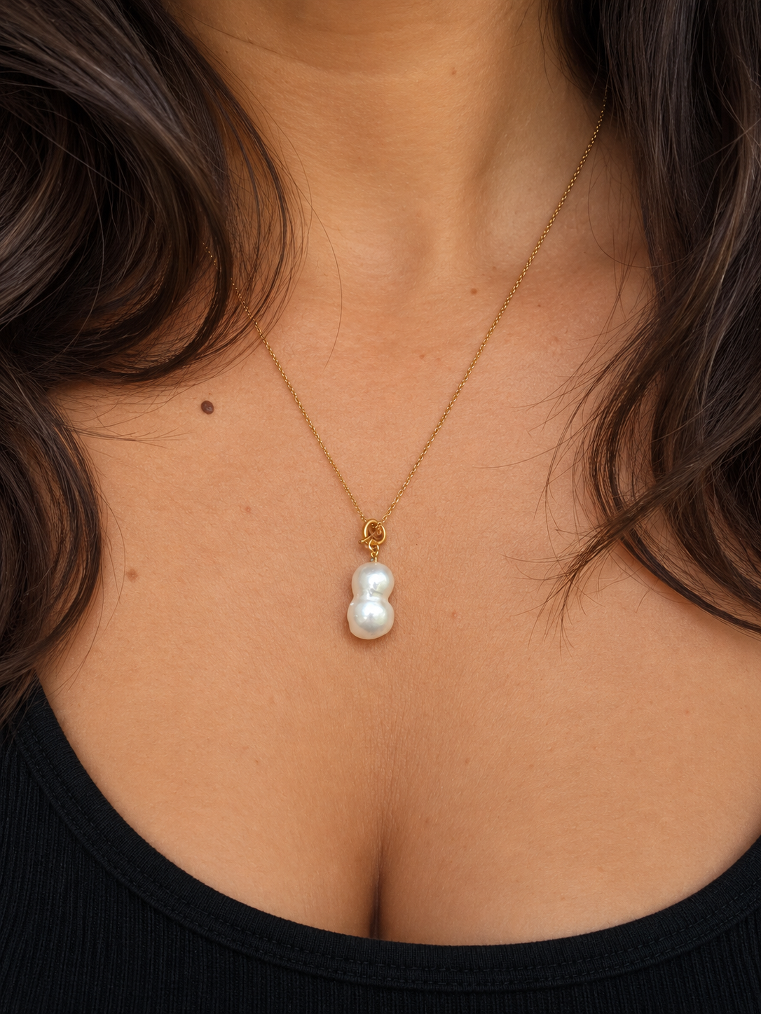Un joli pendentif en perles de culture 