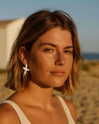 puces en forme de croix en nacre