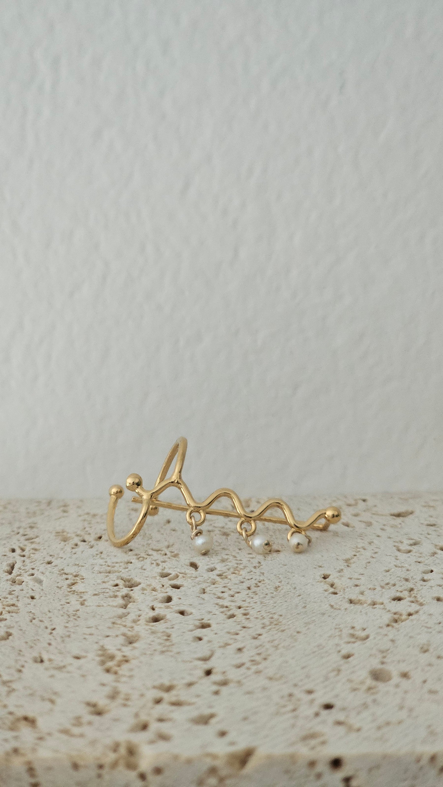 Grimpeur d'oreille en or 